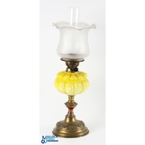 355 - Yellow Embossed Glass Oil Lamp, with a clear transfer etched shade and chimney, with brass fitting m... 