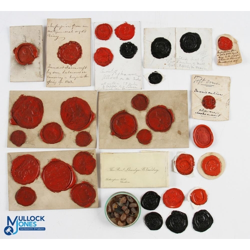 479 - A large collection of wax seals, the red and black seals depicting various crests, predominately mou... 