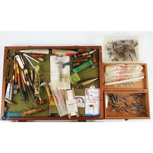 Collection of vintage fishing accessories including Spanguloid clipper and  other lures, cork and qui