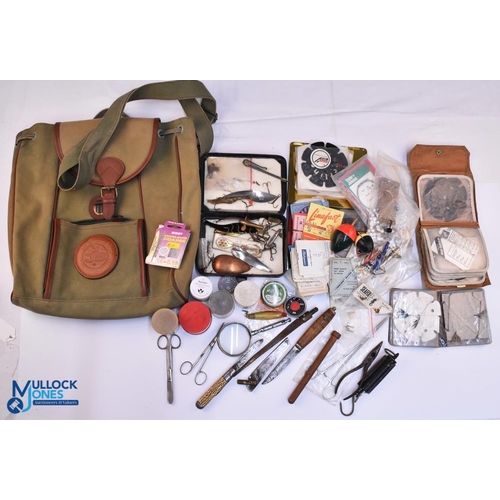 1106 - Fishing Accessories, Tackle Tools, to include a canvas jolly backpack, cast holders, cast, line hook... 