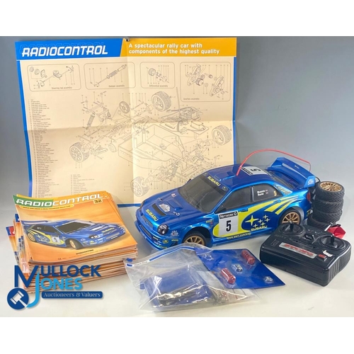 192 - Deagostini Bycmo SUBARU IMPREZA RC Remote Control Car - built model with its 52 magazines and contro... 