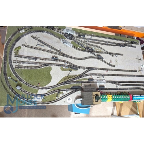 39 - N Gauge Model Railway Layout - Mounted on base board with legs 120 x 60cm complete ready to go to in... 