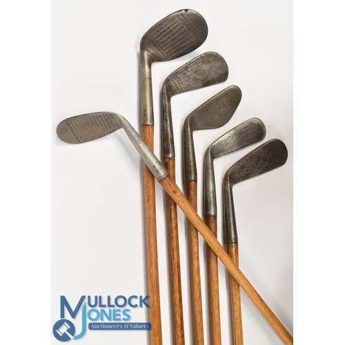 11 - 6x Assorted clubs incl left hand round toed mashie stamped Joy model by Winton, Excelsior niblick, m... 