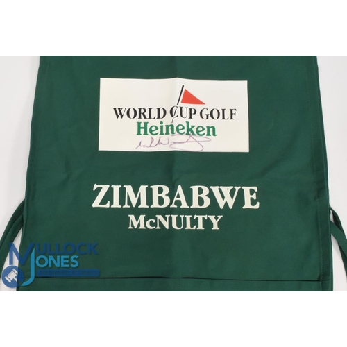 120 - Mark McNulty (b.1953) Signed Caddie Bib - Zimbabwean-Irish Professional Golfer, the bib in green, si... 