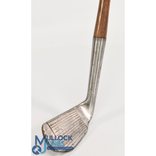 38 - Unusual designed mashie by Gibson of Kinghorn with extended central sole section showing the patent ... 