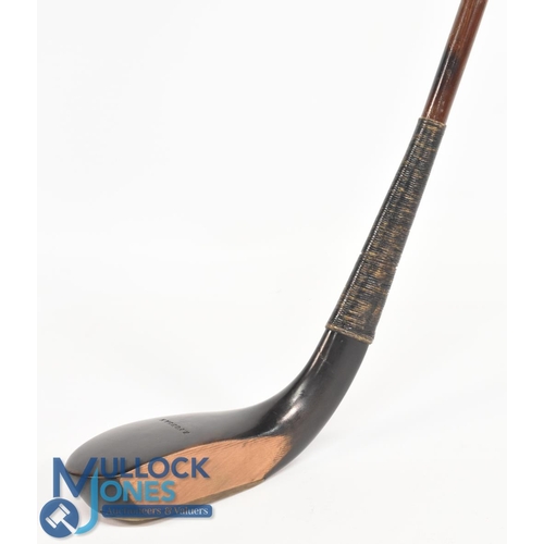 707 - c1875 R Forgan of St Andrews showing the POWF dark stained longnose fruitwood putter fitted with a g... 