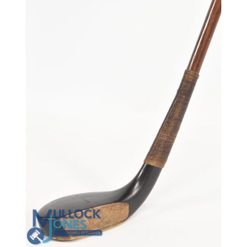 712 - c1890 R Simpson of Carnoustie broad head long nose putter in dark stained beechwood, the hickory sha... 