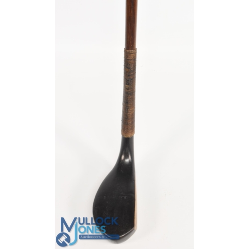 712 - c1890 R Simpson of Carnoustie broad head long nose putter in dark stained beechwood, the hickory sha... 