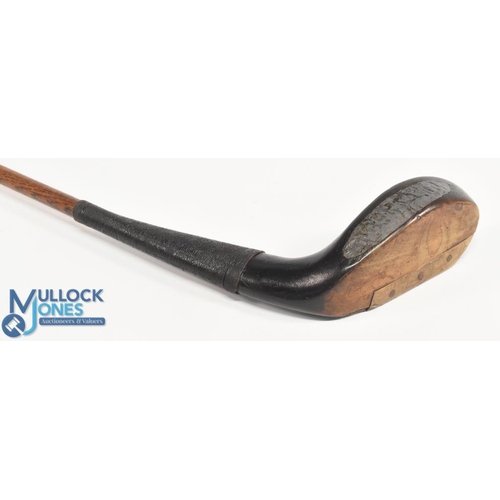 714 - T Aitken of Great Yarmouth c1892 late long nose scare neck putter in dark stained beechwood, showing... 