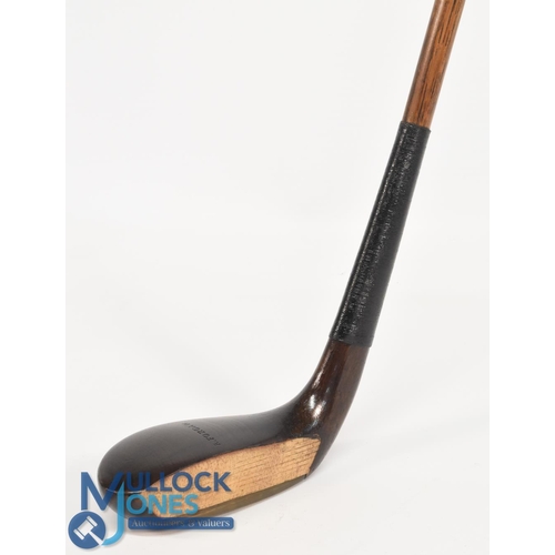 715 - c1905 R Forgan of St Andrews scare neck long nose slim head putter in dark stained persimmon, fitted... 