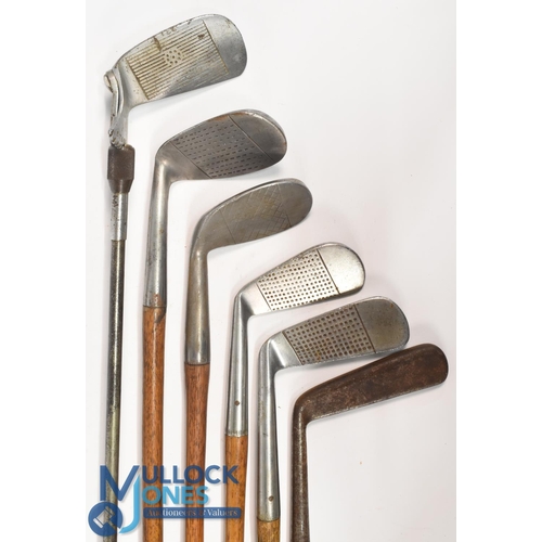 725 - 6x Assorted interesting Golf clubs incl Fairlie's Patent niblick with diamond cut face markings show... 