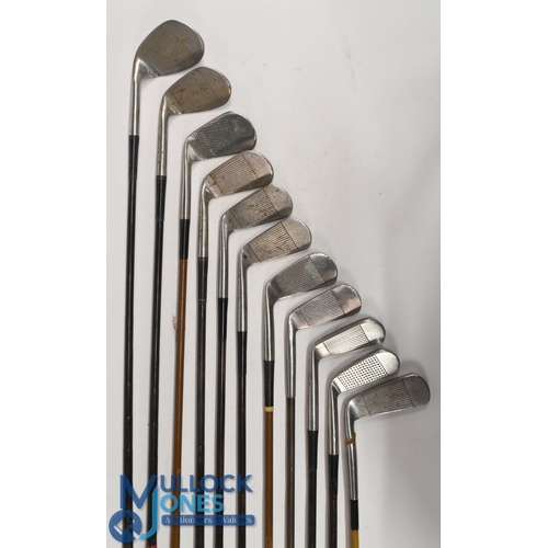 773 - 11x Tom Stewart irons comprising 6x Own model and 5x stamped Tom Morris - all with coated steel shaf... 