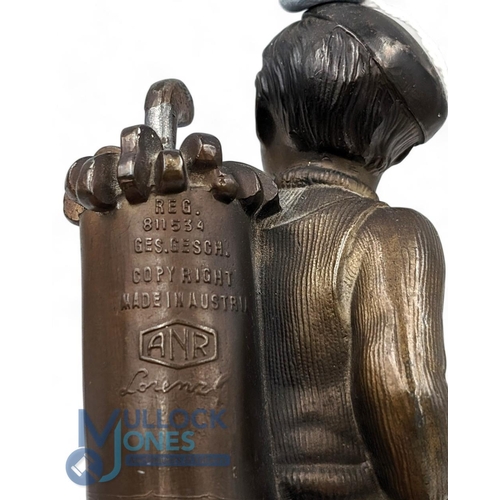 602 - Austrian Spelter Boy Caddy designed by Josef Lorenzl - with a golf bag, the central golf club is the... 