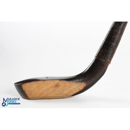 779 - Robert Forgan St Andrews c1875 dark stained beechwood longnose putter showing clear maker's mark and... 