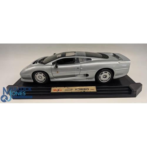 111 - Maisto 1:12 Scale Jaguar 1992 XJ220 comes with Display stand in original box