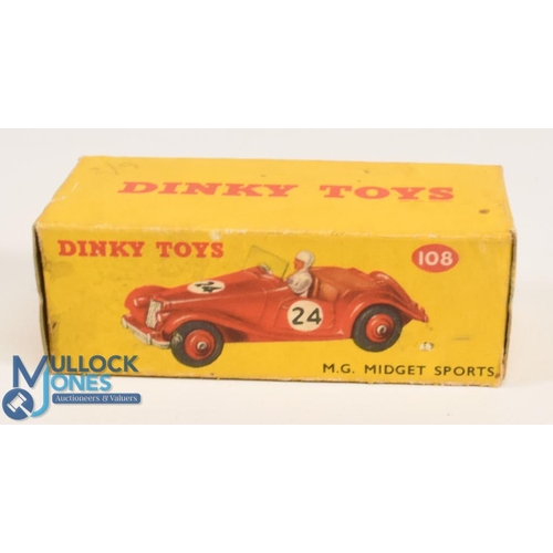 194 - Dinky Toys No 108 M.G. Midget Sports Cream with Red hubs Good clean example in original box