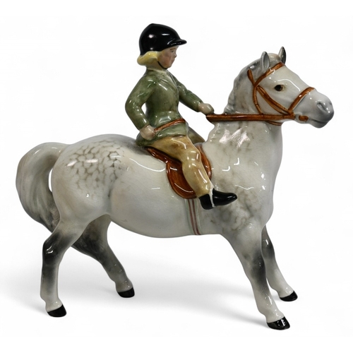 269 - Beswick Girl on light dapple grey Pony Model 1499, wearing a Green Jacket, no visible damage or rest... 