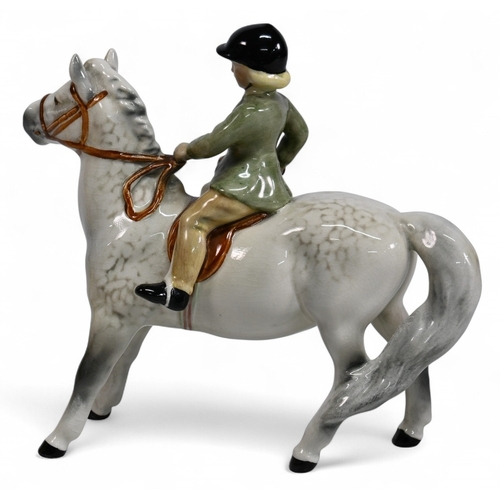 269 - Beswick Girl on light dapple grey Pony Model 1499, wearing a Green Jacket, no visible damage or rest... 
