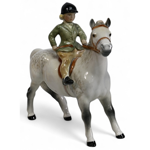 269 - Beswick Girl on light dapple grey Pony Model 1499, wearing a Green Jacket, no visible damage or rest... 