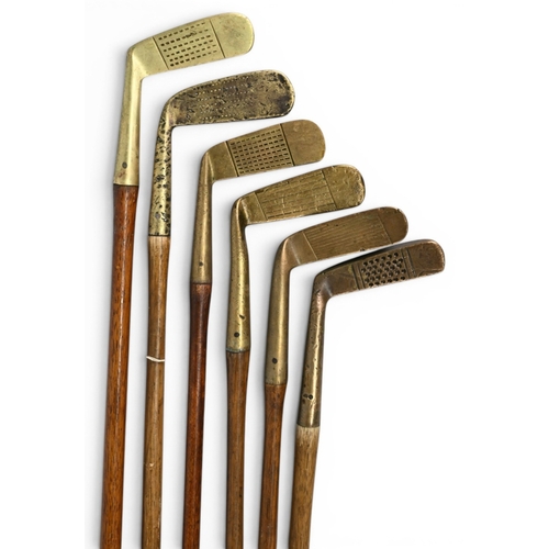 28 - 6x Various styled brass blade putters incl 2x Gems and 4x straight blades – all fitted with grips