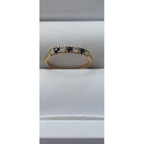 61d - 9ct gold sapphire and clear gemstone size L