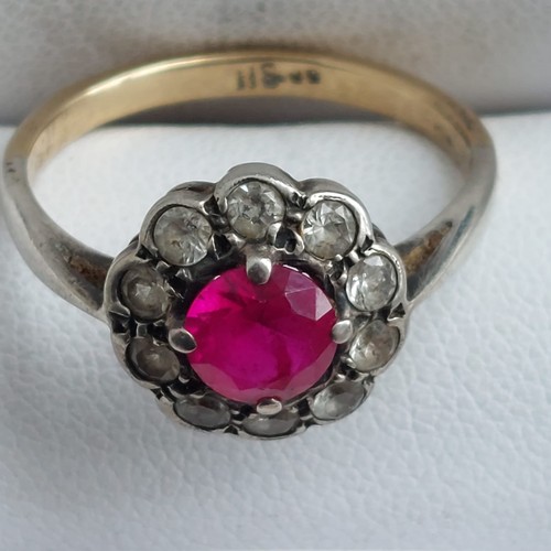 20F - 9ct gold and silver ruby and cz ring. 2.9grms. Size P

relisted due to non payer