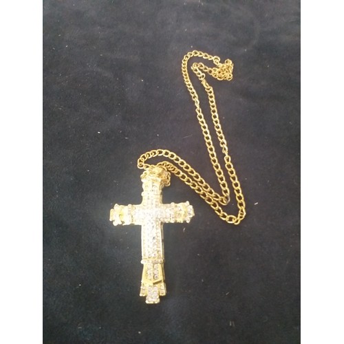 34 - Gold colour large cross on chain