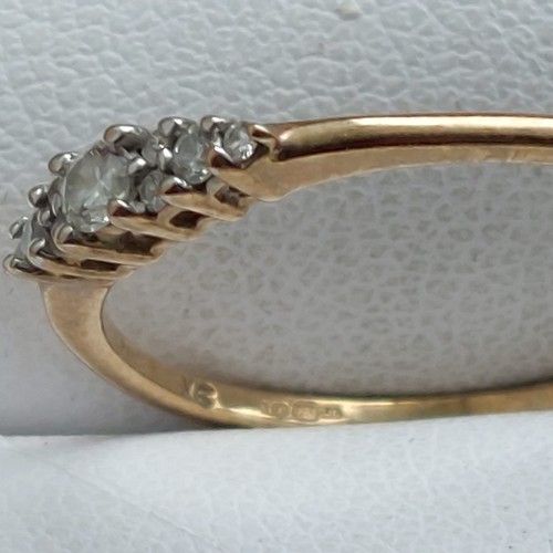 107 - 9ct gold diamond ring