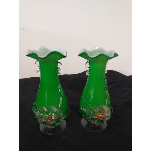 178 - Two matching glass vases