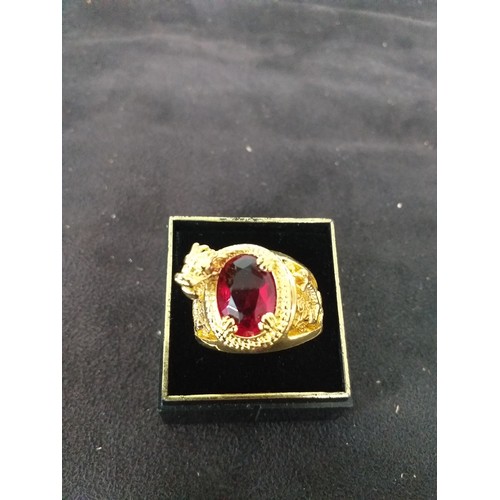 236 - Large red stone gold tone mens ring