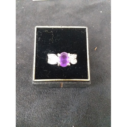 233 - Ladies fashion ring with purple stone