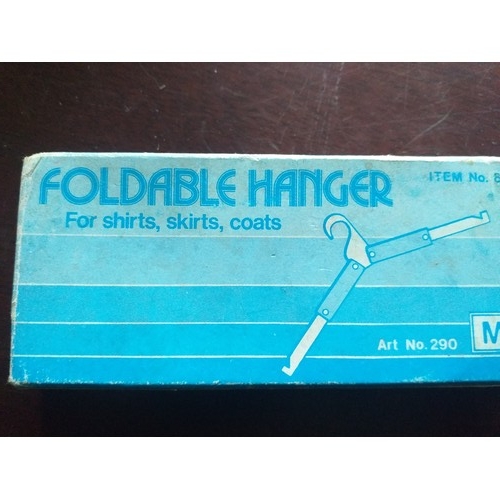 35 - Vintage foldable hanger in box