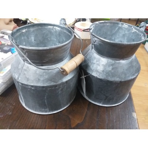 148 - Two milk churns style plant pots small