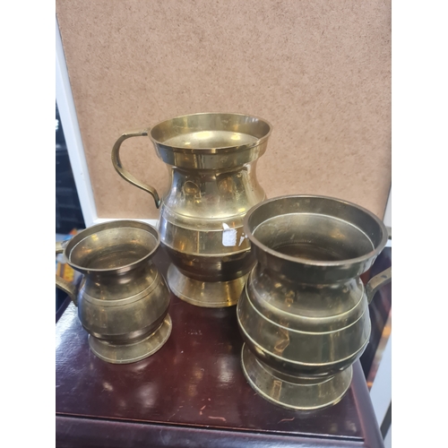 5A - 3 large brass jugs
