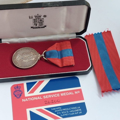 15E - National service medal to mrs jan ashburner