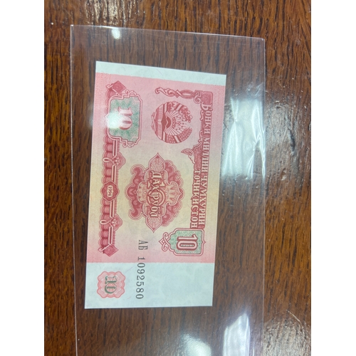 28 - Uncirculated foreign bank note