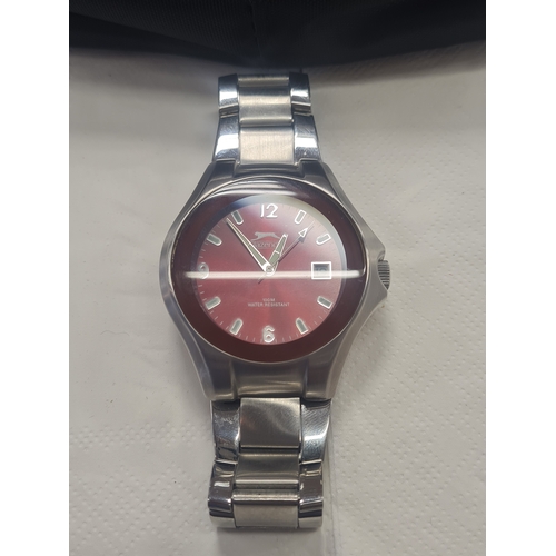 029H - Slazenger cased watch working