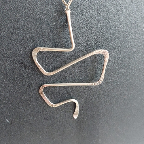 27H - 9ct silver necklace and silver snake pendant