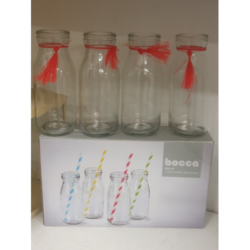 78 - Set of 4 glass Bocca Milk Bottles