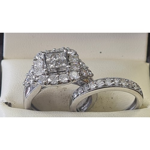 06S - 9ct white gold wedding set 2 ct diamonds

1.6 carat in engagement ring 
0.4 ct in wedding band size ... 