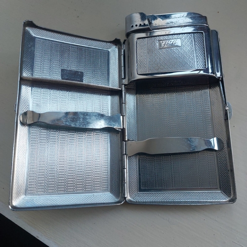 120A - Combined cigarette case and lighter