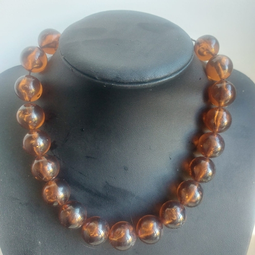 348 - Vintage faux amber stringed necklace