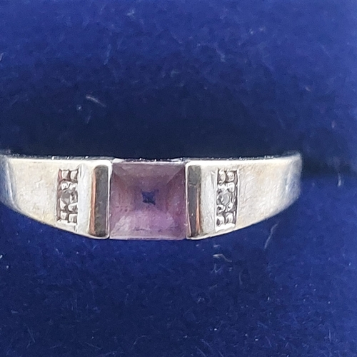 004I - 9ct white gold and amethyst ring. Box included