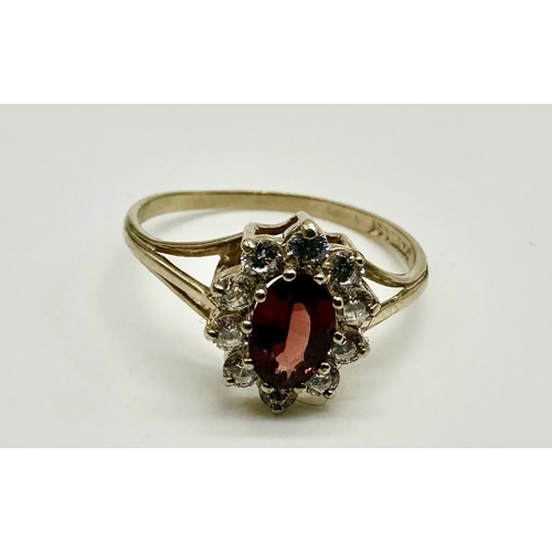 947 - 9ct Gold Garnet And Cz Cluster Ring Size M