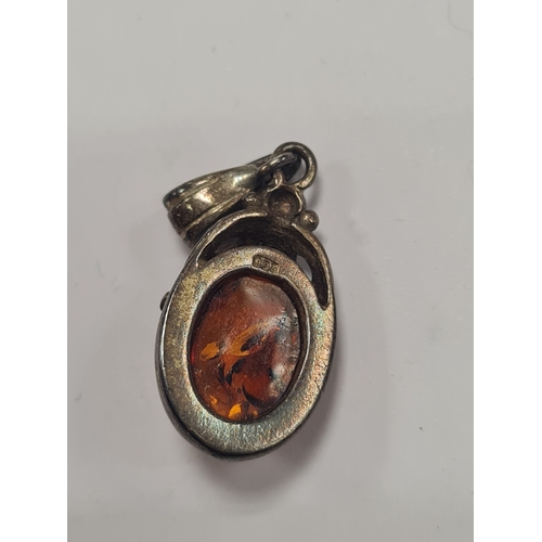 09 - Vintage amber & silver pendant