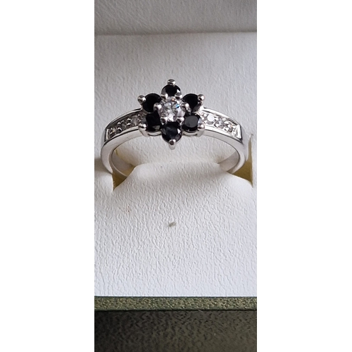 273 - . 925 silver and cz ring size T