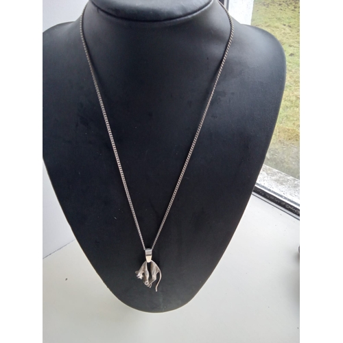 281 - Large cothic pendant and chain.  Silver and white metal