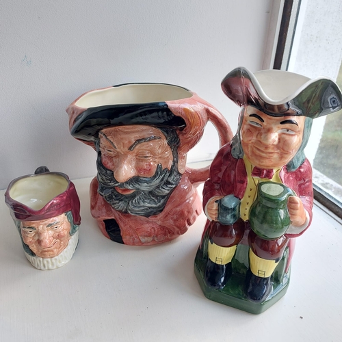 296 - 2 royal doulton + Staffordshire toby jug