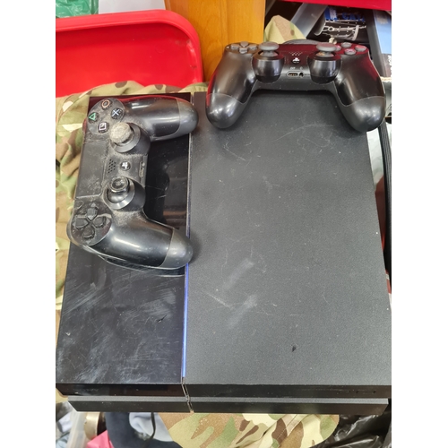 01Z - Playstation 4 console with 2 controllers