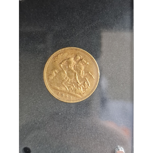 006 - 22ct gold half sovereign